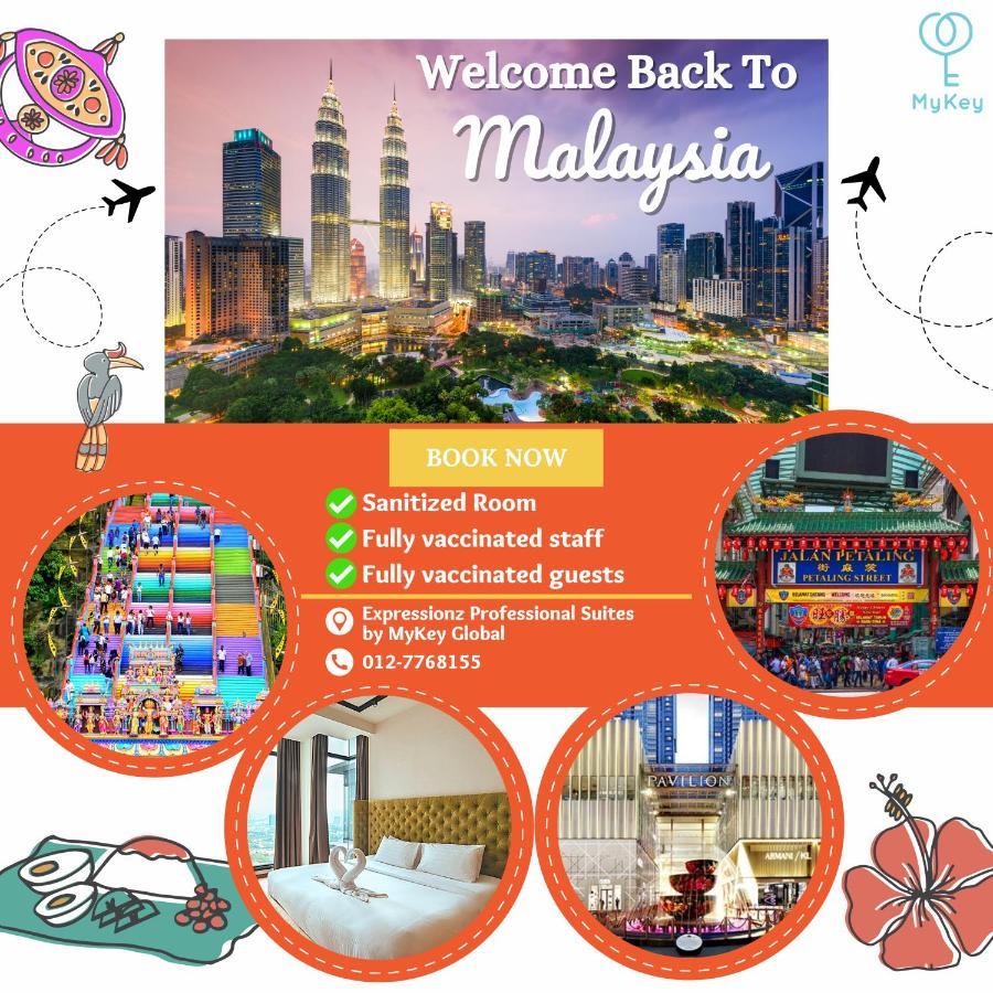 Expressionz Professional Suites By Mykey Kuala Lumpur Exteriör bild A poster advertising the reopening of Malaysia's borders to tourists.
